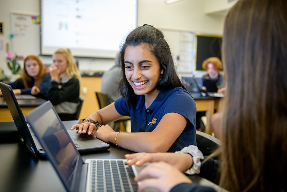 SFC Upper School student smiling in class